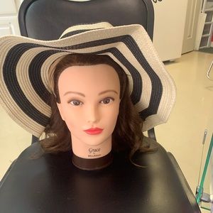 Travel sun hat. Rolls up and snaps for easy travel.